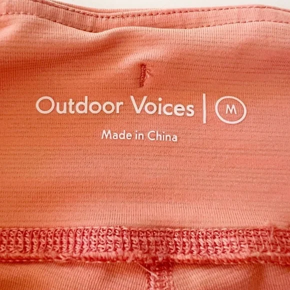 Outdoor Voices Tech Sweat Biker Shorts in Heathered Orange Peach - Picture 10 of 16